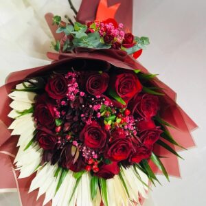 12 Pcs of red roses ,5 pcs of hypericum with some dry