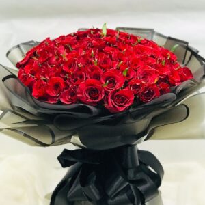 70 Pcs of red roses with black wrapping